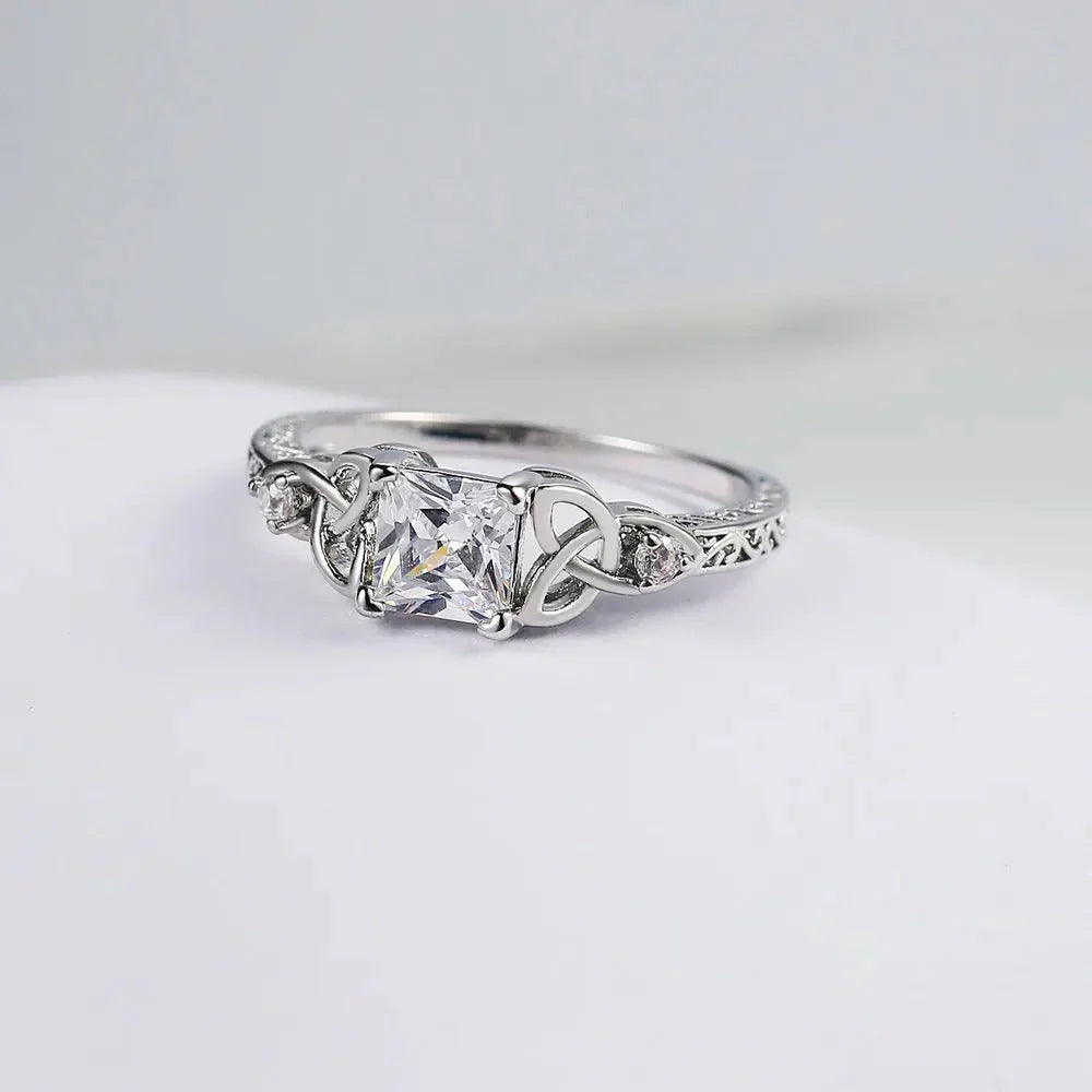 Silver Center Square Gem Knot Design Ring